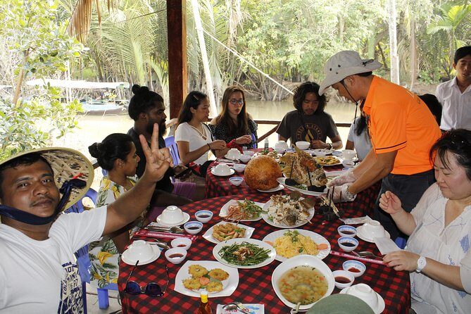 1-Day Mekong Delta Cai Rang Floating Market-Ancient House-Pancake - Music and local atmosphere: when the guide matters