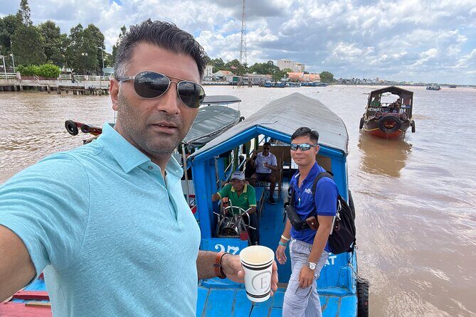 A day to Mekong River Delta & Cu Chi Tunnels - with lunch - Getting Started in Ho Chi Minh City: Pickup and the Opera House Stop