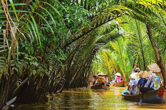 Cu Chi & Mekong Delta Day tour - Thai Son Island: Honey Tea, Tropical Fruit, Singing, and Coconut Candy