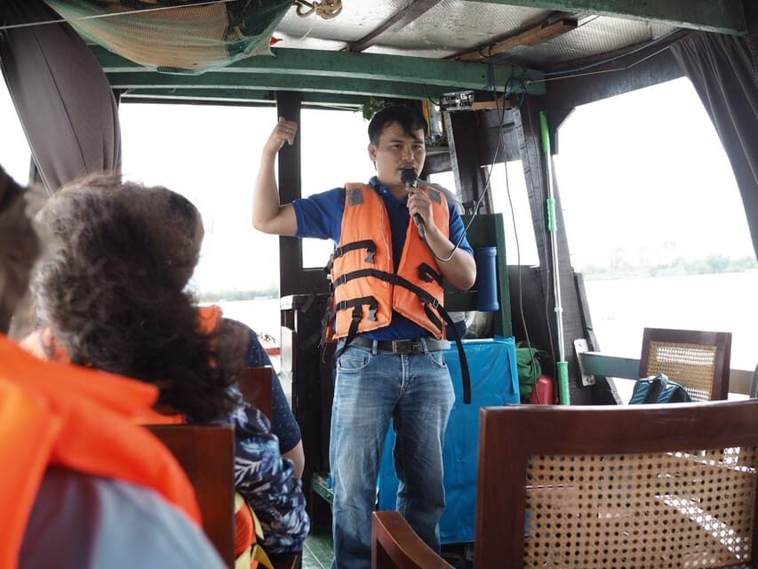 Cu Chi Tunnels and Mekong Delta Full Day Tour - Hand-rowed sapan: the slow boat that makes the day click