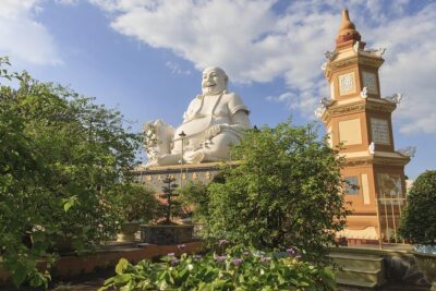 From HCM City: Mekong Delta Tour with Sampan Journey - My Tho and Vinh Trang Pagoda: where architecture does the talking