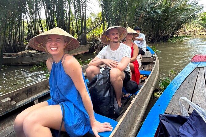 From HCM City: Mekong Delta Tour with Sampan Journey - Sampan ride through coconut canals on Unicorn Islet