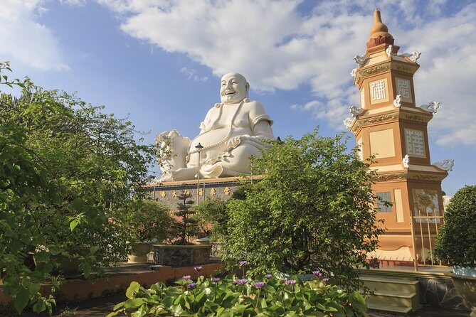 From HCM City: Mekong Delta Tour with Sampan Journey - My Tho and Vinh Trang Pagoda: where architecture does the talking