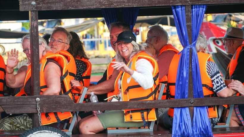 From HCM: Tour 2 day Mekong Can Tho Cai Rang Floating Market - Day 2: Cai Rang Floating Market in the Morning + Noodles, Monastery, and Returning to HCM