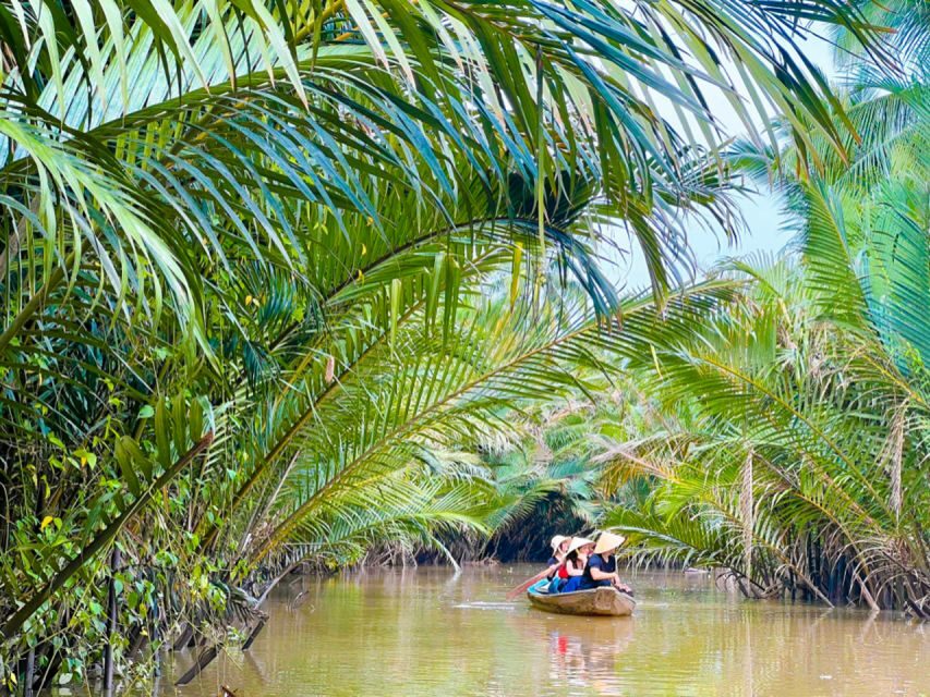 From Ho Chi Minh: Explore Mekong Delta & Vinh Trang Pagoda - Village roads, canal rowing, and the python farm option