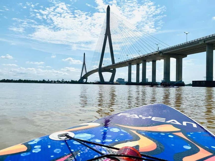 From Ho Chi Minh: Mekong & Cai Rang Floating Market 2D1N - My Tho cruise port: islets, fish rafts, and Rach Mieu Bridge views