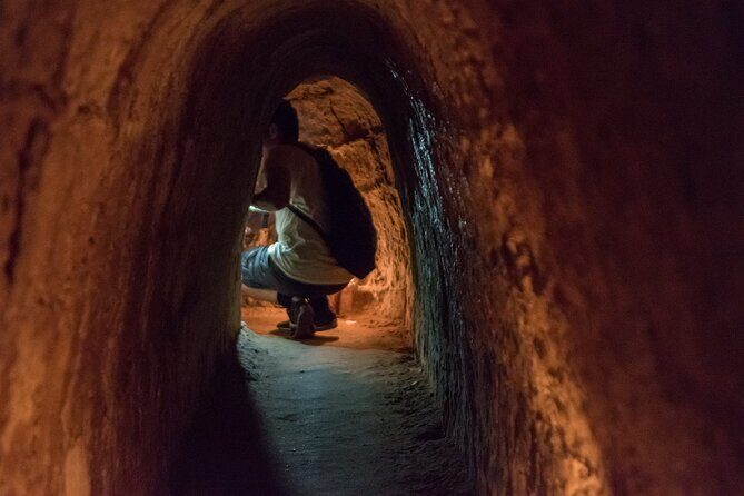 Full day Cu Chi Tunnels And Mekong Delta Guided Tour - Sampan canals, short cycle, coconut candy, and honey tea
