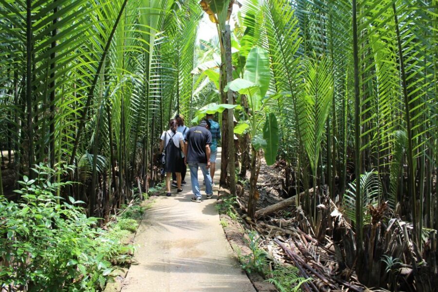 Ho Chi Minh City: Discover Mekong Delta & Coconut Village - My Tho and the Mekong River: Motorboat Views, Then Canal Silence