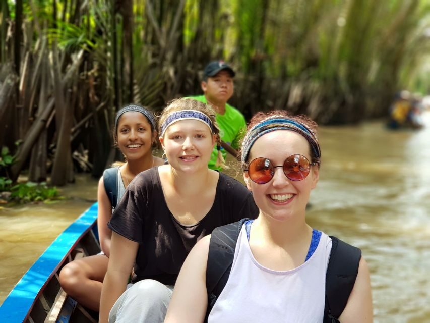 Ho Chi Minh: Full-Day Cu Chi Tunnels and Mekong Delta Tour - Coconut island stop, fruit tastings, and the village music moment