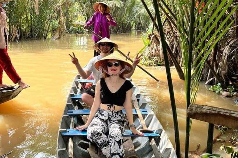 Mekong Delta Day Trip From Ho Chi Minh - Small Group Tour - Unicorn Island walking lanes, fruit orchards, and folk songs