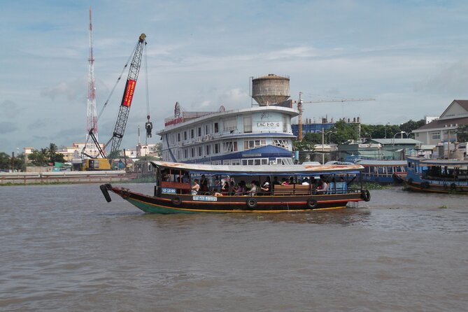 Private Mekong Delta Less Tourist - Coconut Island Tour - Vinh Trang Temple: A Quick Cultural Reset in 30 Minutes