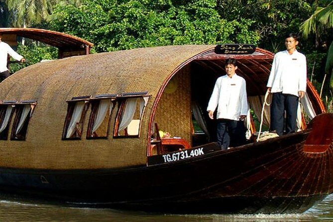 Song Xanh Sampan Mekong Cruise 2 Days 1 Night - Day 1: Phu An Jetty departure with tea, fruit, and slow river time