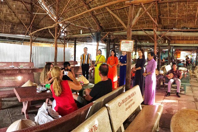 VIP Tour Cuchi Tunnels & Mekong Delta Cruise Full Day Group 12pax - My Tho and the Mekong: boat ride, bee-farm-style stops, and folk music